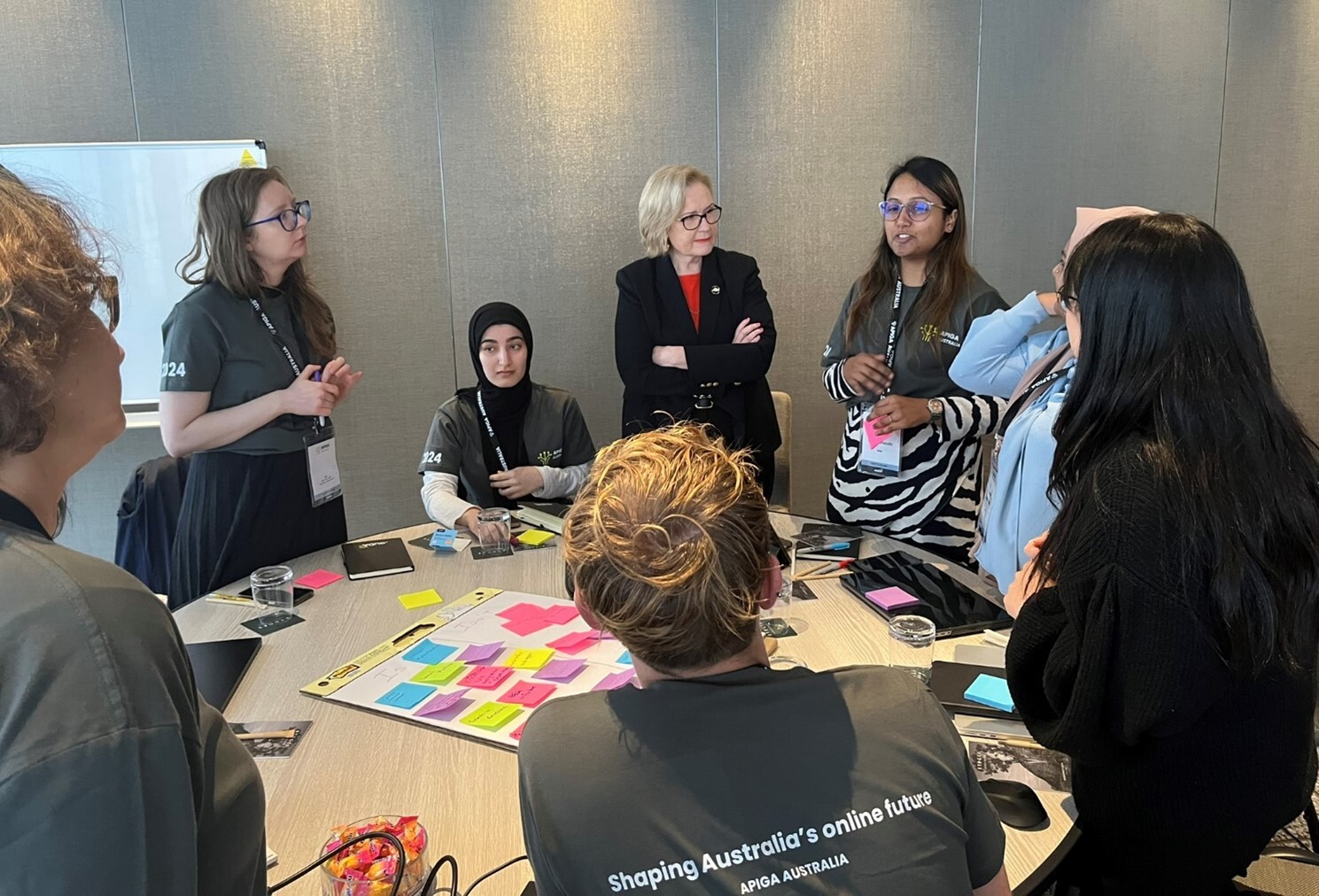 auDA CEO Rosemary Sinclair AM engages with participants during a workshop